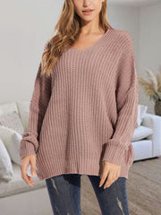 Relaxed fit ribbed knit sweater in Dusty Pink with V-neck and batwing sleeves.