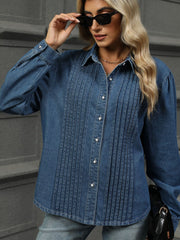Navy denim shirt with puffed sleeves and front pleats