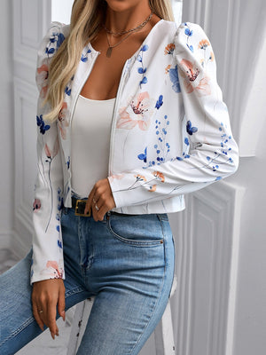 White floral puff sleeve cropped zip jacket with a round neckline.
