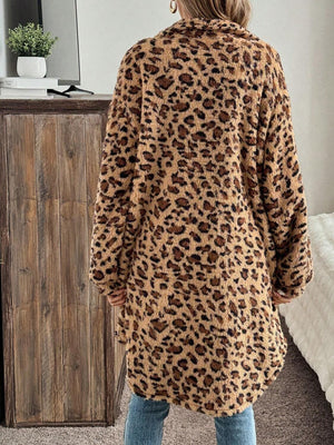Leopard print shaggy button-down duster with long sleeves and a relaxed fit.
