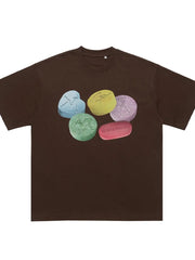 Brown cotton crew neck t-shirt with graphic print of colorful pills and text.