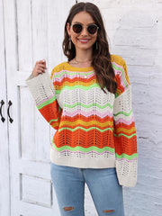 Crochet sweater with rainbow wave pattern, crew neck, long sleeves, and open knit details.