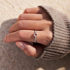 Silver pavé oval chain link ring with sparkling stones.