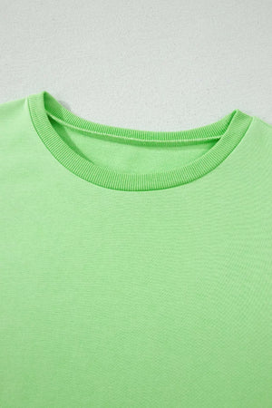 Light green cotton two-piece set with crew neck and ribbed trim.