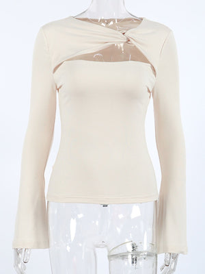 Beige long-sleeve shirt with knot front and chest cutout detail
