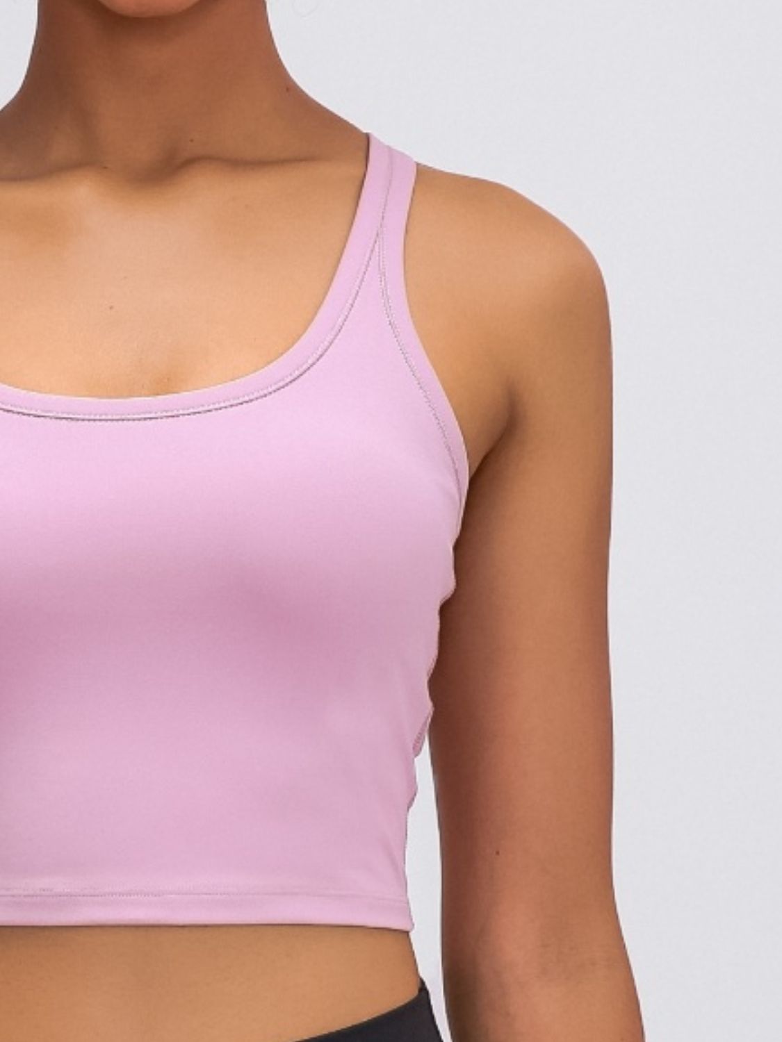 Dusty Pink Sculpted Racerback Crop Tank with scoop neckline and racerback detail.