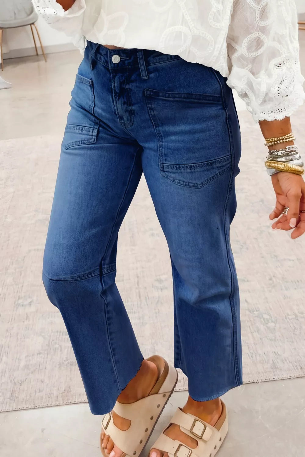 Maternity jeans in dark blue denim with a straight leg and utility pockets.