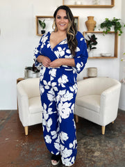 Cobalt floral kimono jumpsuit with wide legs and a V-neck.