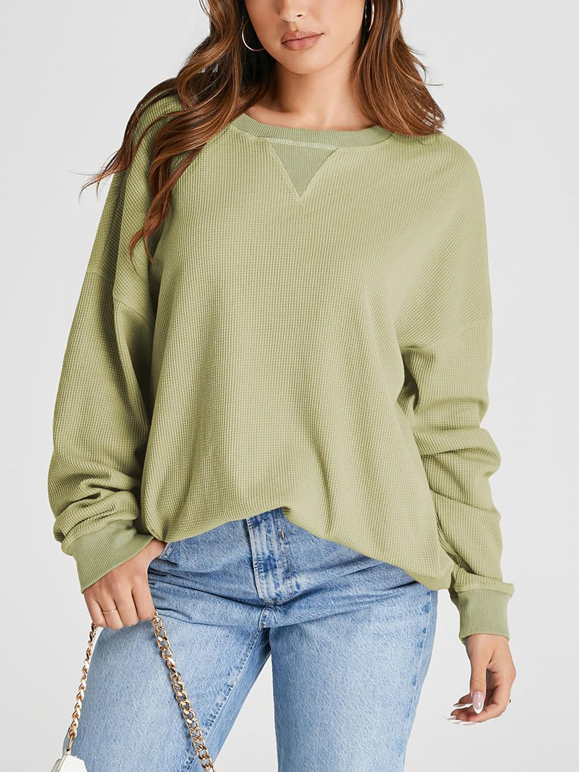 Sage waffle knit raglan sleeve sweatshirt with V-neck detail and crew neck.
