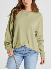 Sage waffle knit raglan sleeve sweatshirt with V-neck detail and crew neck.