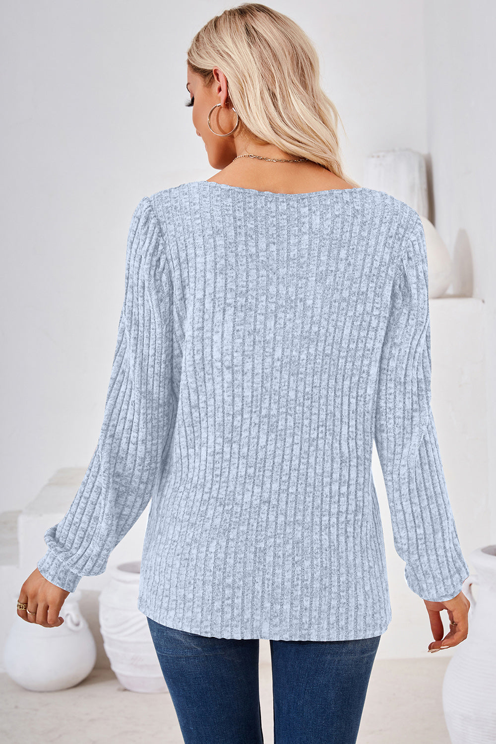 Light Blue ribbed square neck top with puffed sleeves and long sleeves.