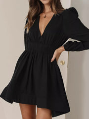 Black V-neck mini dress with puff sleeves and a-line skirt
