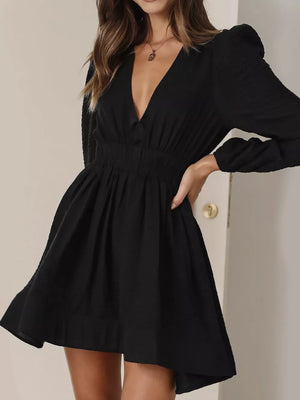 Black V-neck mini dress with puff sleeves and a-line skirt