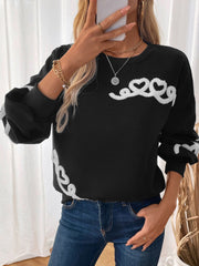 Black sweatshirt with embroidered heart detail on sleeves and chest