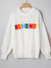 White chenille holiday sweater with rainbow HO HO HO graphic and crew neck.
