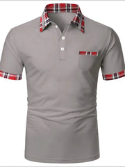 Gray polo shirt with plaid trim on collar, pocket, and sleeves.