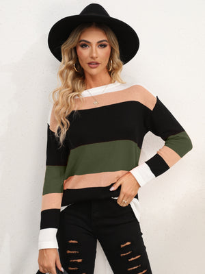 Colorblock crewneck knit sweater with relaxed fit and acrylic material.