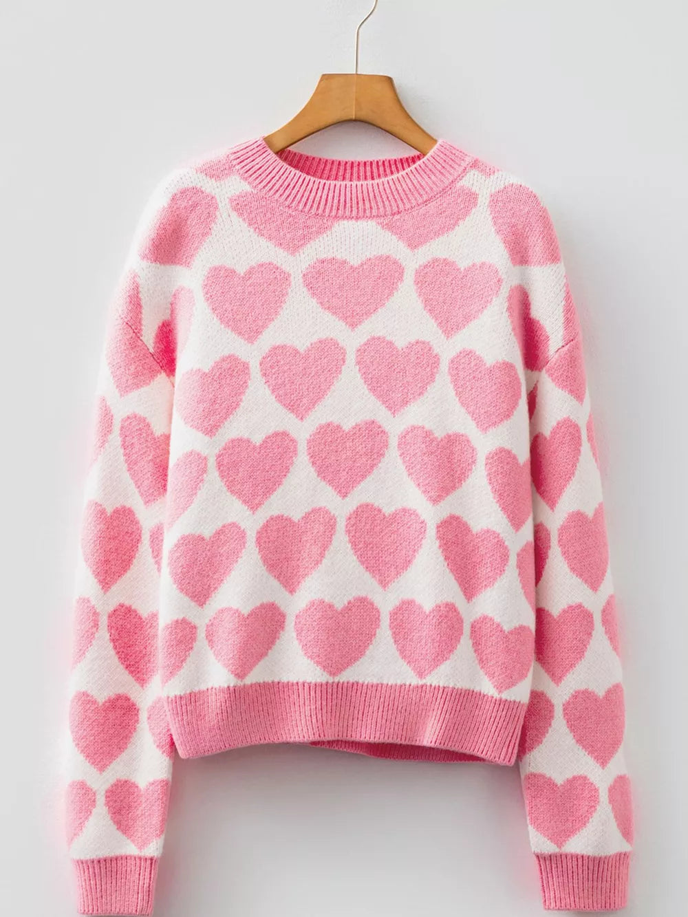 Charming Heart Pattern Knit Sweater in blush pink and white acrylic with crew neck.