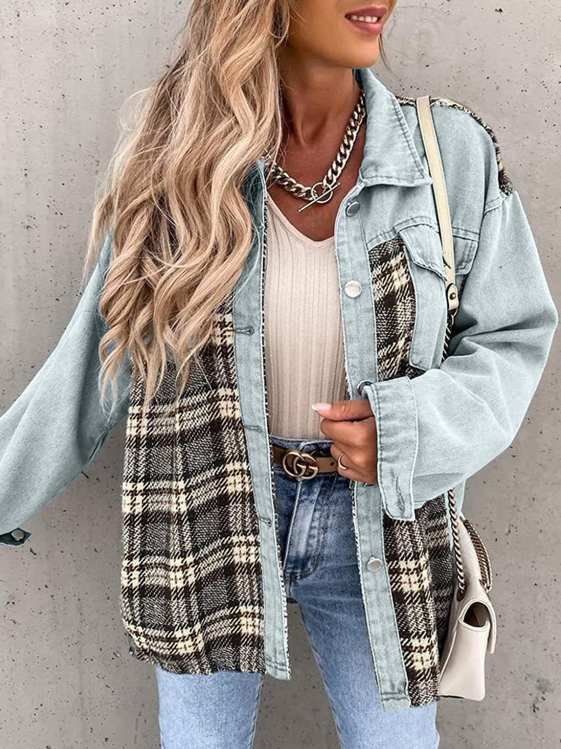 Light blue denim jacket with brown plaid panels, button front, and collared neckline.