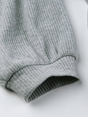 Grey ribbed knit hoodie sleeve cuff detail