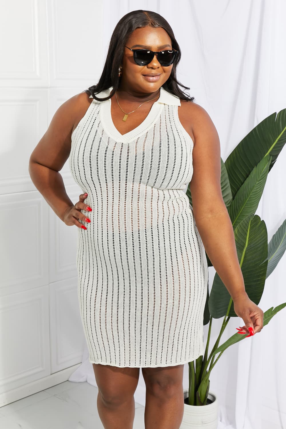White open-knit collared midi cover-up with vertical stripe pattern and V-neck.