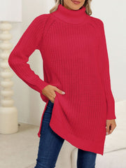 Scarlet knit turtleneck sweater with asymmetric hemline and side slits.
