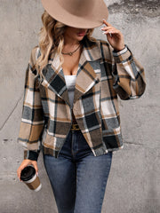 Checked plaid cropped moto jacket in camel with a zip front and wide lapels.