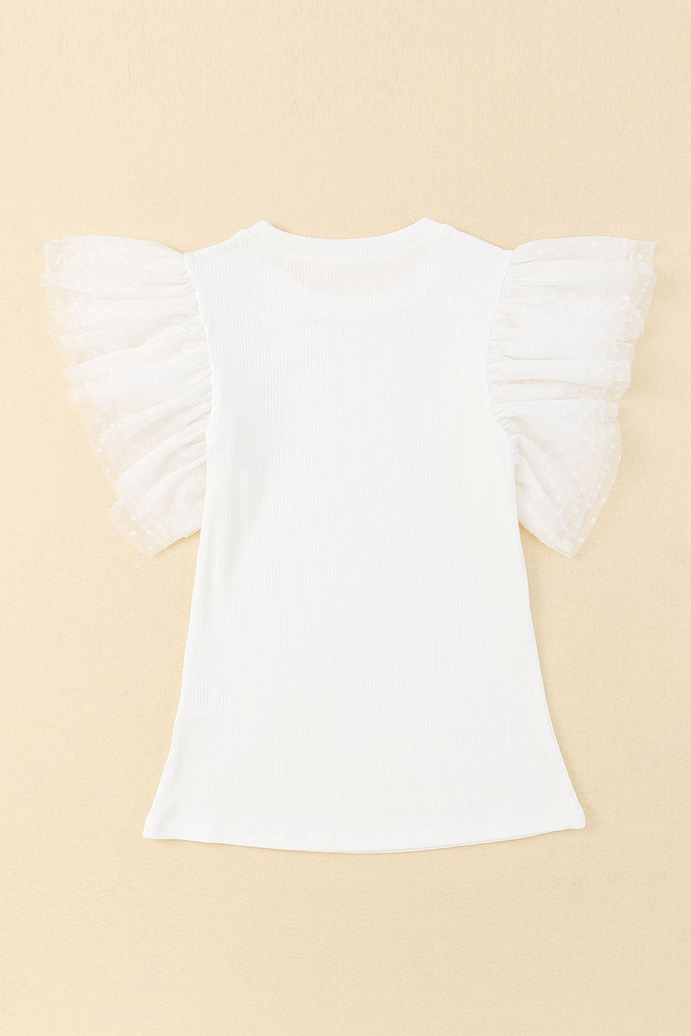 White ribbed knit blouse with sheer tulle ruffle sleeves.