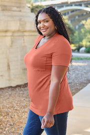 V-neck pocket tee in watermelon pink with short sleeves and a relaxed fit.