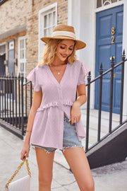 Lilac flutter sleeve peplum top with ruffle detail and button front.