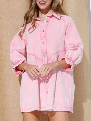 Blush pink denim button-down dress with ruffled cuffs and balloon sleeves.