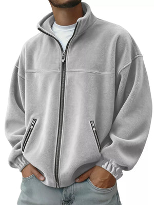 Men's light gray fleece zip-up jacket with zippered pockets and mock neck.