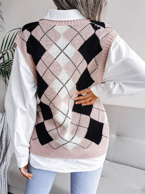 Argyle knit sweater vest in dusty pink with black and white diamonds, V-neck, sleeveless.