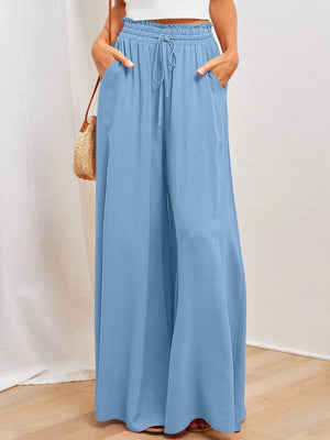 Light blue textured drawstring palazzo trousers with pockets