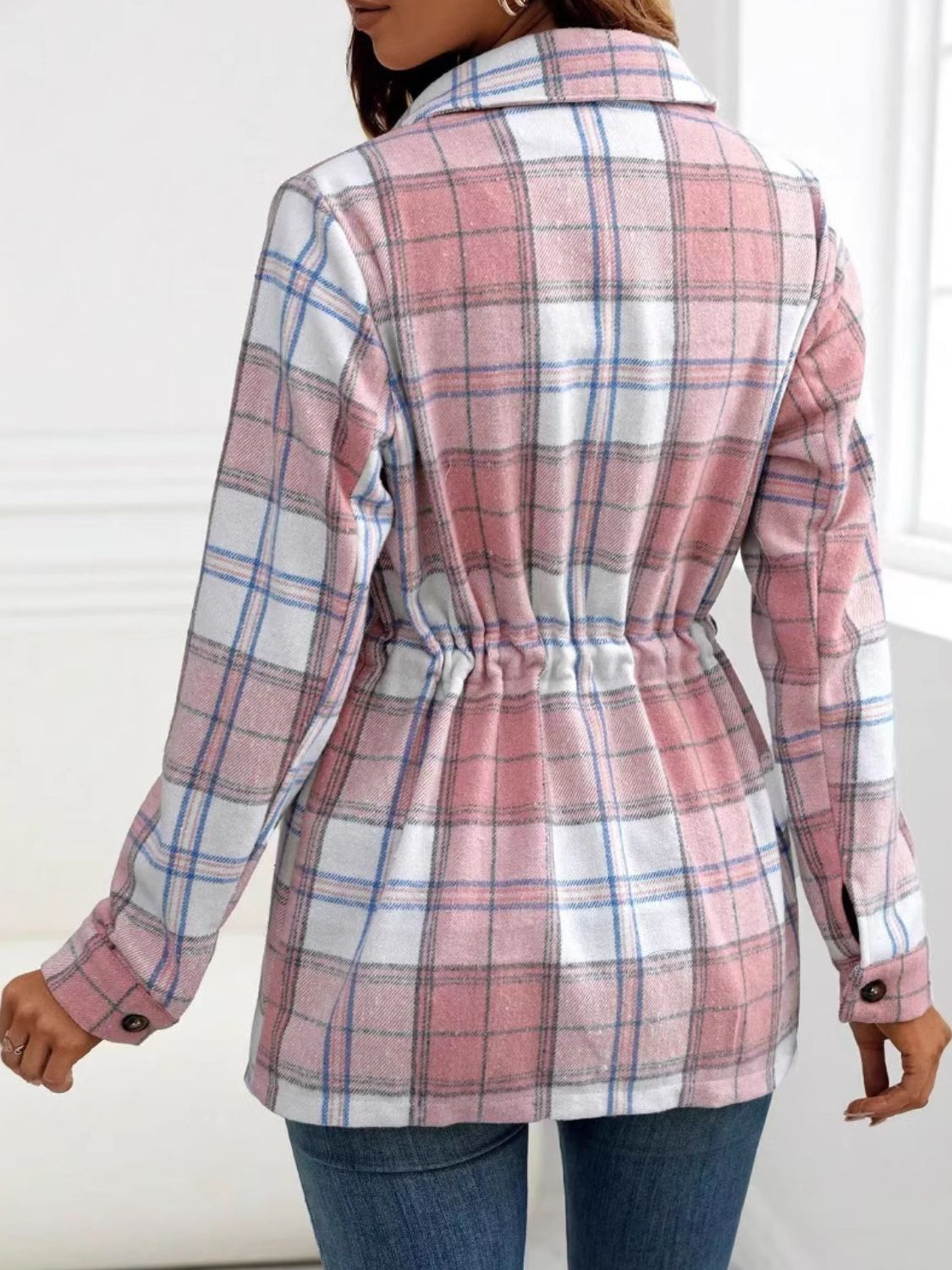 Belted blush pink plaid shacket with drawstring waist and utility detailing.
