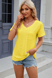 Yellow perforated pocket tee with rolled sleeves and V-neck.