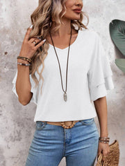 White jersey tee with tiered flutter sleeves and V-neck.