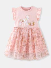 Pink baby dress with unicorn embroidery, ruffle cap sleeves, and floral print tulle skirt.