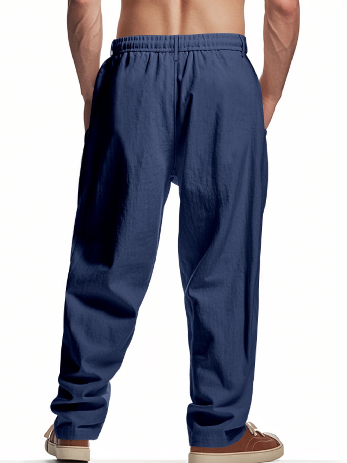 Navy blue men's sweatpants with drawstring waist and loose fit, shown from the back.