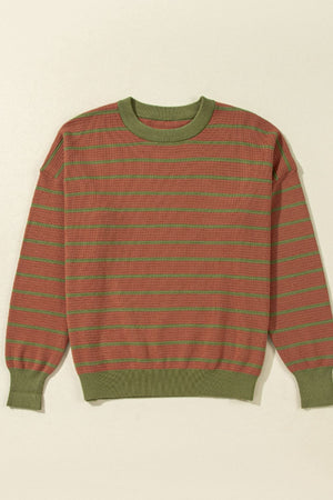 Waffle knit sweater with green stripes and olive green trim.
