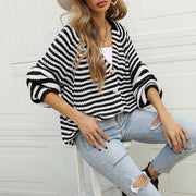 Black and white stripe button-up knit cardigan with wide sleeves