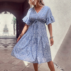 Light blue ditsy floral tiered midi dress with v-neck and tie waist