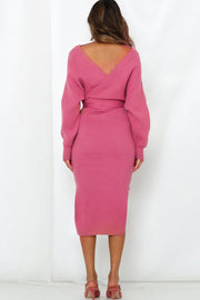 Wrap-front midi knit dress in hot pink with a belted waist and V-back.