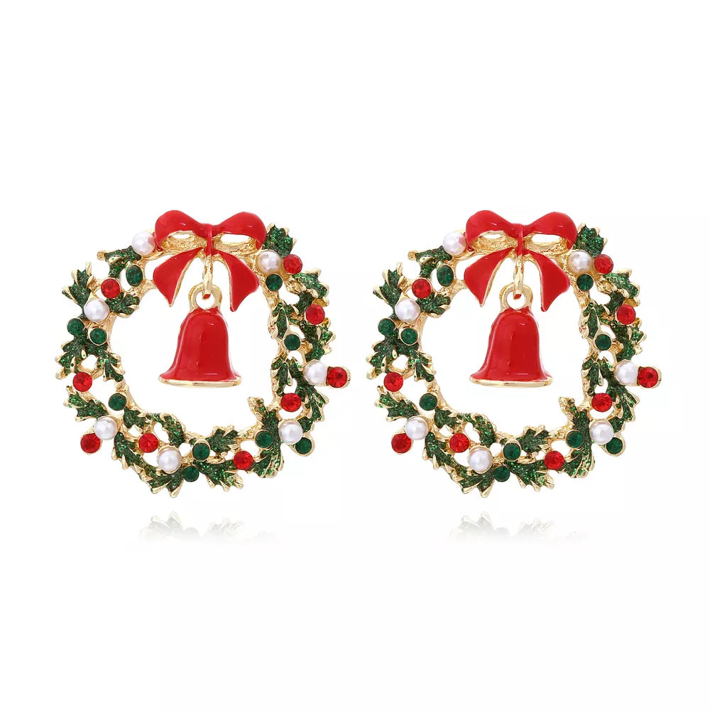 Festive wreath-inspired dangle earrings with red bells and bows, adorned with red and green beads.