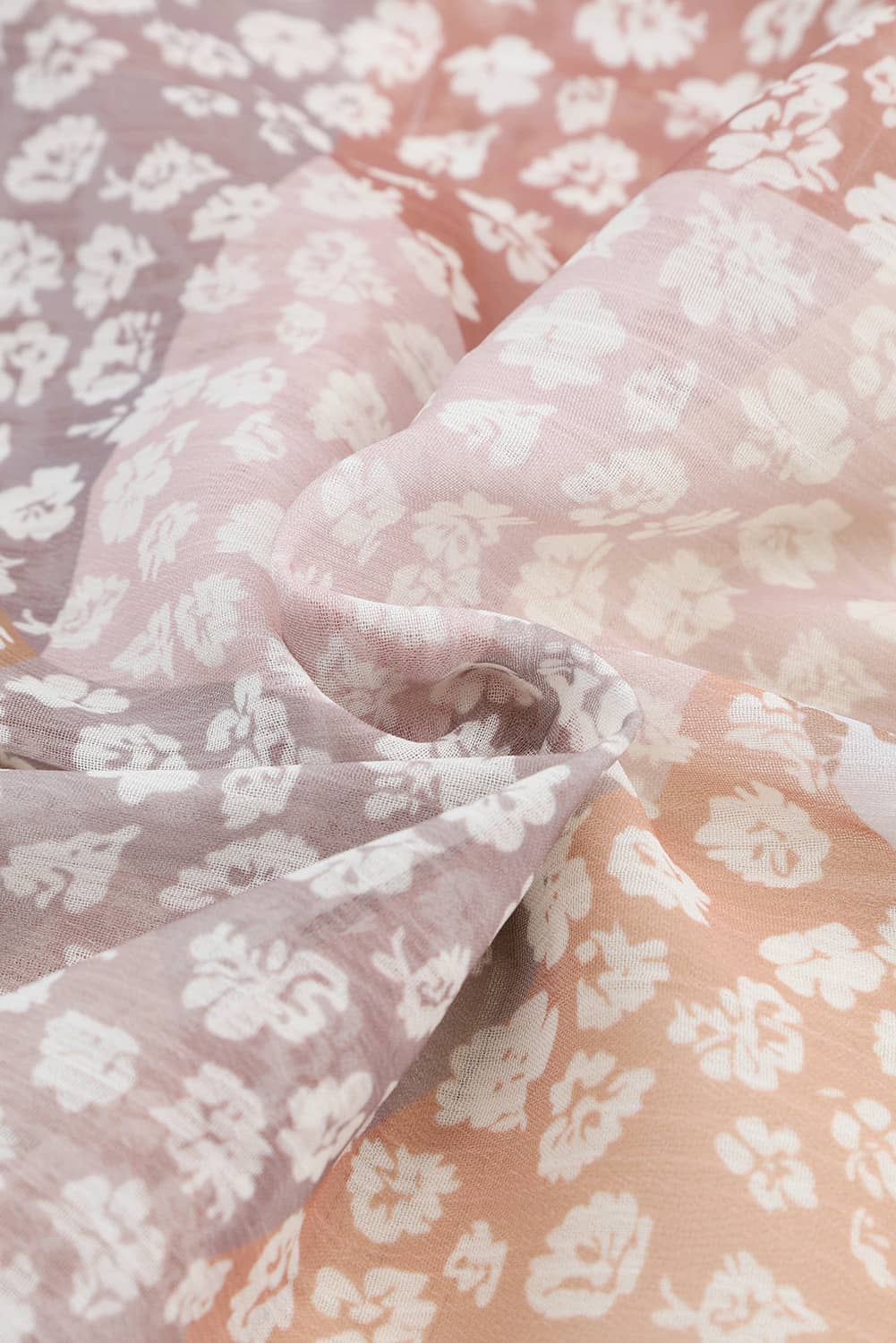 Patchwork floral maxi skirt in floral print with soft gradient colors.