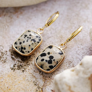 Turquoise stone and gold drop earrings with black spots, 18K gold-plated.