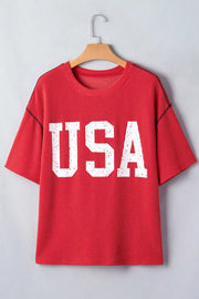 Red twisted rib t-shirt with distressed white USA graphic and crew neck.