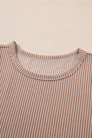 Tan textured stripe tank top with crew neck and ribbed trim.