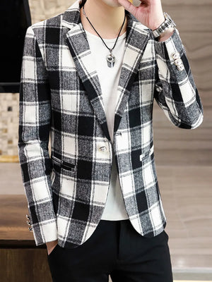 Men's black and white plaid blazer with button front and notched lapel.