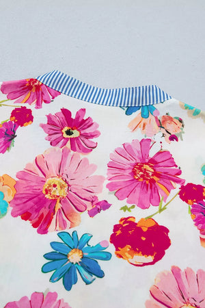 Vibrant floral print cotton blouse with blue striped collar
